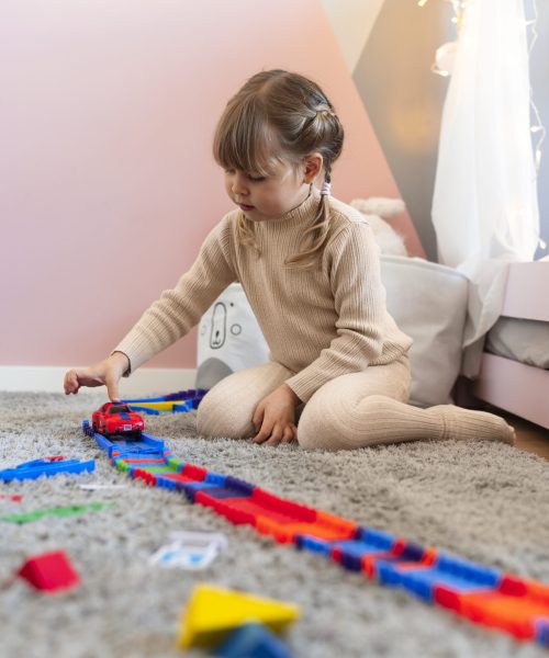 close-up-child-playing-her-room